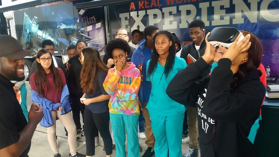 AFTER INLET? Members of the Community Outreach Admissions Department drove down from Full Sail University in Orlando in their high-tech truck to discuss different programs and showcase different types of technology. They also offered the opportunity to play student-designed video games while Sophonie St. Louis, right, tried out the new Virtual Reality headset.