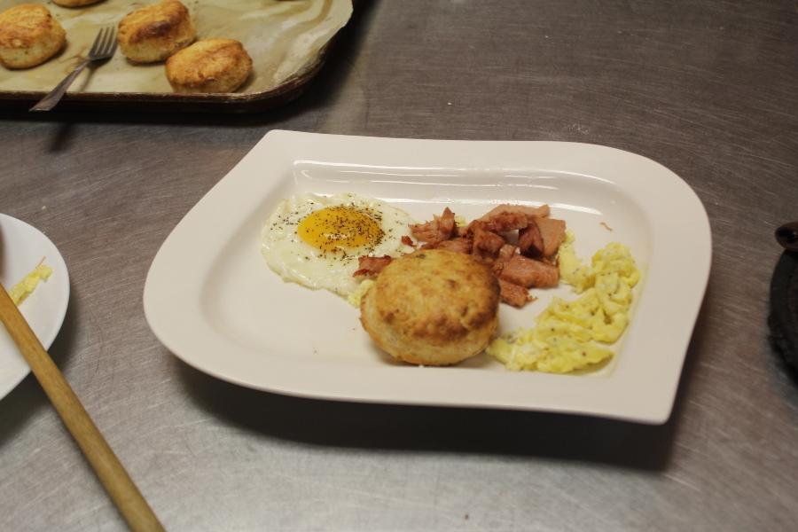 EGGCELLENT: Culinary Academy students were challenged by Chef Newman to prepare eggs in different ways including: scrambled, fried, or trying to make an omelet. Some groups added biscuits and ham to impress Chef even more.