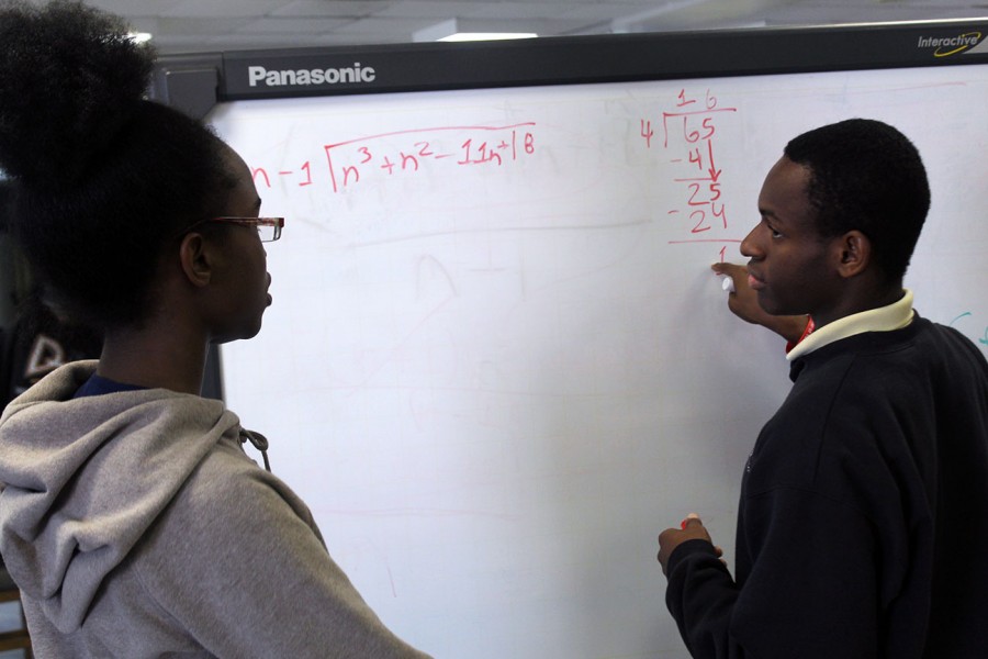 Mathematicians: Jasmine Trail receives help from peer tutor Stefhon Jean-Claude.