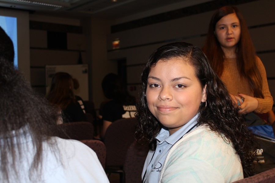 JOURNALISM WORKSHOP: Sarah Perez (center) and Itza Mendez (right), both freshmen, joined other Inlet Grove Hurricanes and dozens of other students at The Palm Beach Posts second annual event.