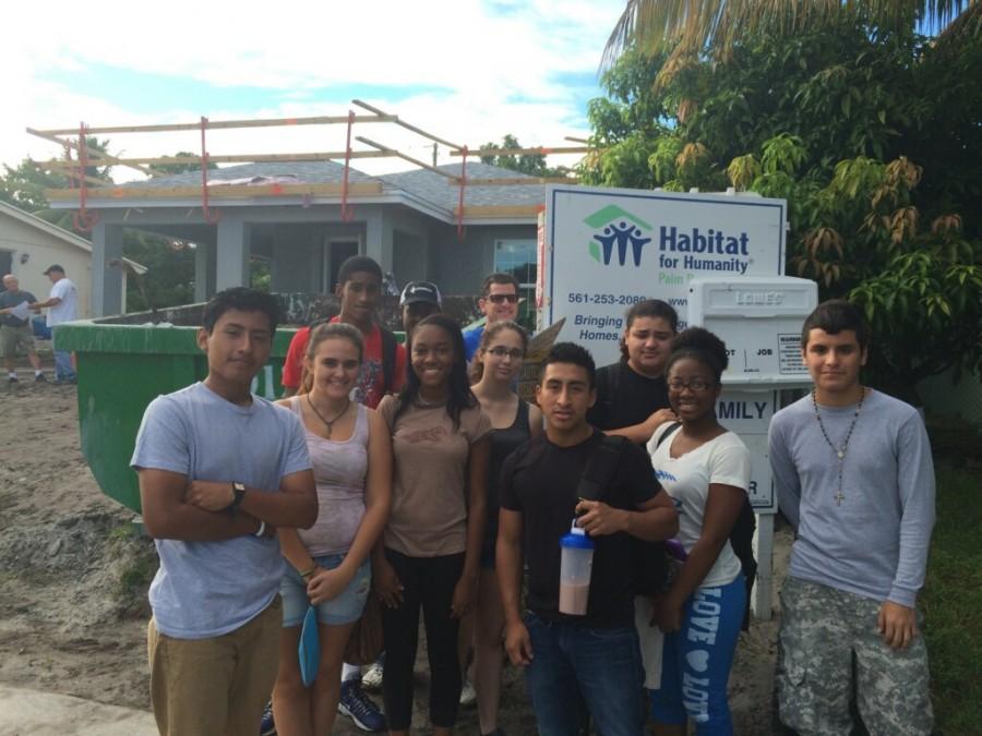 Pre-Architecture Academy instructor Todd Moreys crew helping with construction of a new home for Habitat for Humanity, Oct. 6.