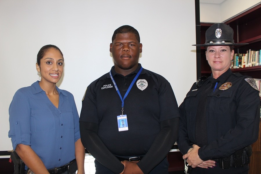 Andrew Agnew along with members of the Police Explorers Program inform Inlet Grove Pre-Law students about aspects and benefits of the organization. 