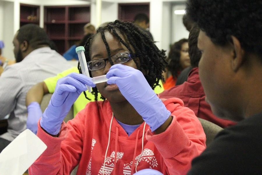 DNA-TASTIC: Scientists from the Scripps Florida Research Institute captured DNA while informing and training parents about resources and strategies to improve their childs science skills during an evening that highlighted the STEM Program offers at Inlet Grove.
