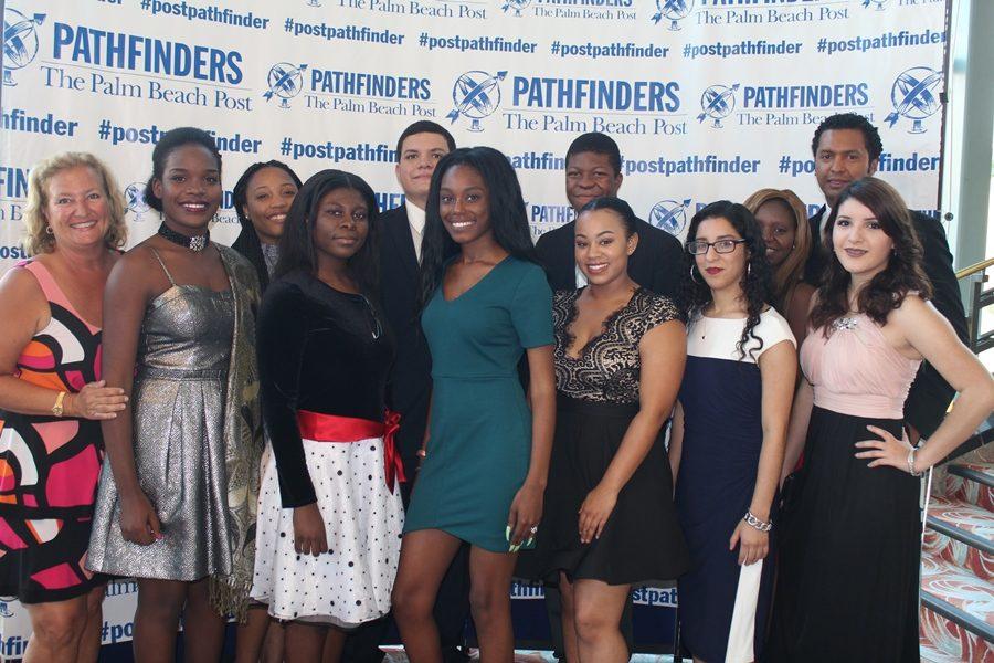 SMILE: Our Inlet Grove  PathFinder nominees attend the annual Pathfinder High School Scholarship Awards where they are recognized for their outstanding achievement in categories such as academics, vocational, and athletics.  From left to right: Lonnie Martens (Pre-law teacher), Dieumitha Ferdelus, Megan Tackore, Shirley Pierre, Andrew Sandoval, Dejanai Williams, Derico Jones, Shaylla Renejuste-Robinson, Angie Garcia, Zahira Lovett,  Francisco Lopez (Sophomore AP) and Osmara Salazar. 

 




