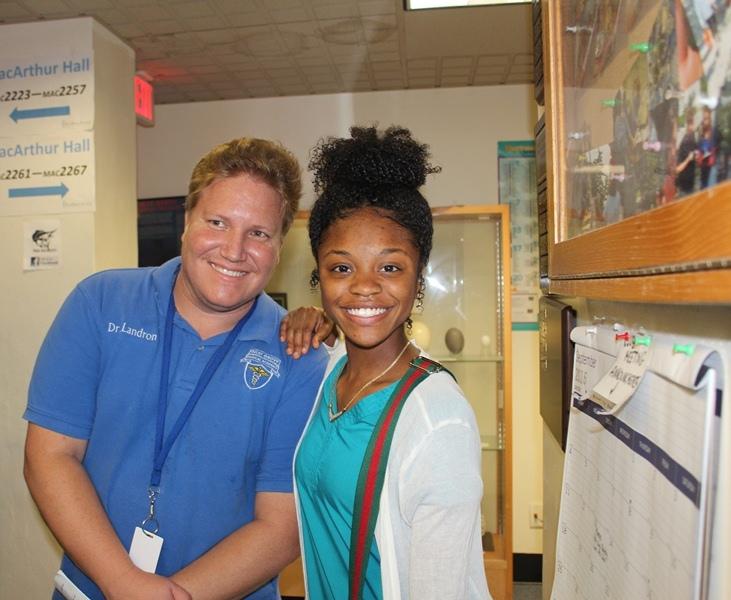 MEDICAL ON THE MOVE: Dr. Landron, left, and Donasia Wilson in a chemistry classroom while enjoying the Hurricane Medical Academy students visit to Palm Beach Atlantic University on Sept. 28.