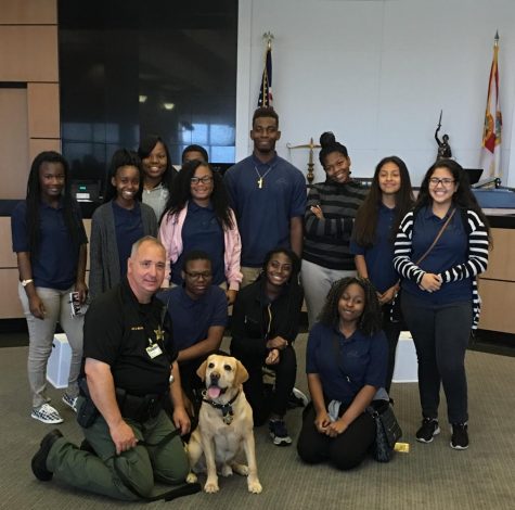 CLASS ACTION: Pre-Law instructor Dr. Kerkhoffs students experienced meet-and-greets with judges, bailiffs and K-9 dogs, and observed the closing arguments in a criminal trial, May 4 during the “Law Week” activities at the Palm Beach County Courthouse.
