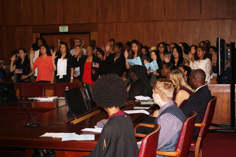 I HEREBY DECLARE: The Hon. Judge James M. Hopkins had new applicants for American citizenship raise their right hands as he read the Oath of Allegiance during the naturalization ceremony that Inlet Grove Hurricanes attended Oct. 27 at the Paul G. Rodgers Federal Courthouse in West Palm Beach.