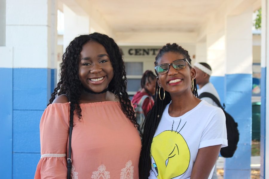 MERRY CANES-MASS: Class of 2017 LPN students Shannon James, left, and Numgine Jean-Bernard visited the campus and reconnected with former teachers as they reminisced about their four years as a Hurricanes.