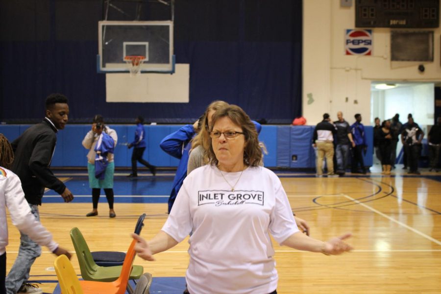 LET THE GAMES BEGIN: Assistant Principal Mrs. Pientka and student and staff contenders participated in musical chairs, among other activities Jan. 19 during the new years first Pep Rally.