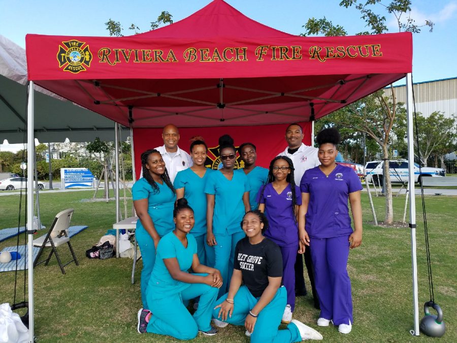 PROVIDING AND INSTRUCTING: The EMR, EKG, and LPN medical students provided blood pressure and blood glucose screenings, as well as instructing the community on how to properly perform hands-only CPR at the Riviera Beach Marina Feb 10.  While there they also promoted sun safety by handing out sunscreen.
