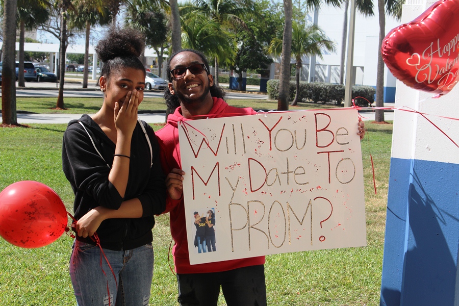 I DO: With prom right around the corner, Greg Dozier, right, proposes the big question to Jadan Wright with a speech in front of friends.