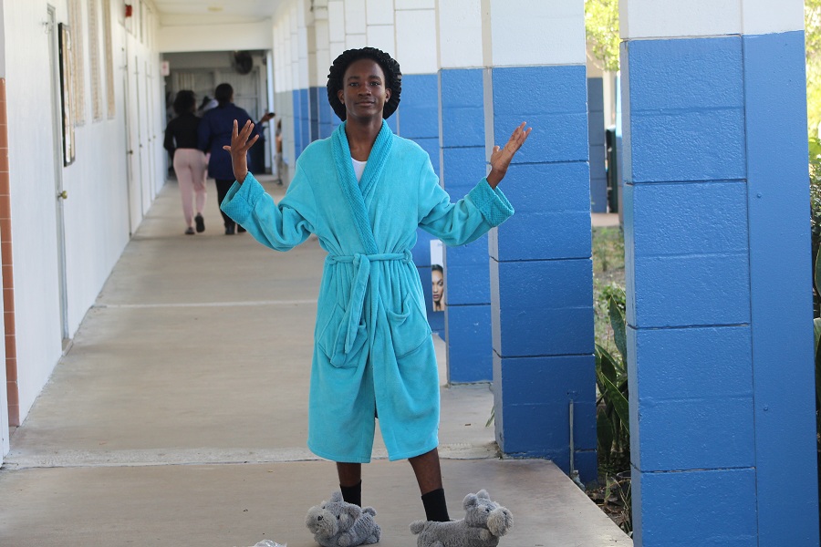 DAY OF THE PAJAMAS: Mark Filsaime wore his bath robe, dog slippers and shower cap to kick of Spirit Week. βPeople who dressed up for Pajama Day have nothing on me,β Mark said.