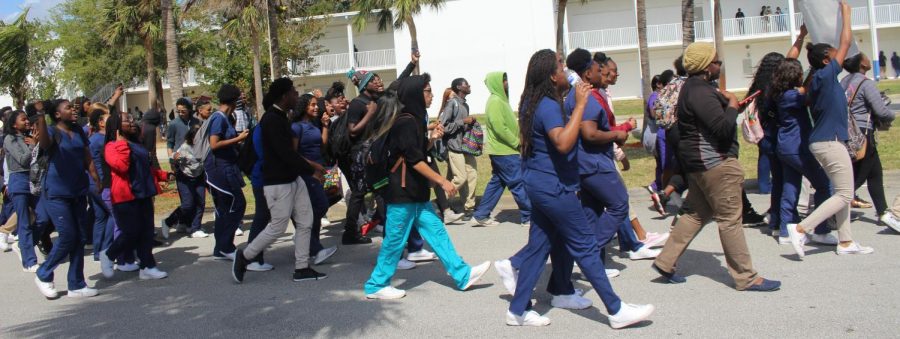 SUPPORT: Hurricanes walk out to honor those who lost their lives to gun violence at Marjory Stoneman Douglas High School in Broward County on Wednesday, Feb. 14.