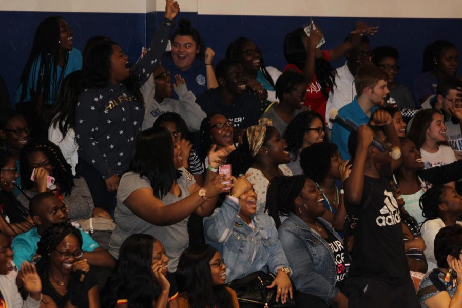 STIRRING-UP THE CROWD: Students and staff gathered for the first pep rally of the year in the gymnasium before the Varsity Football teams first district home game. 