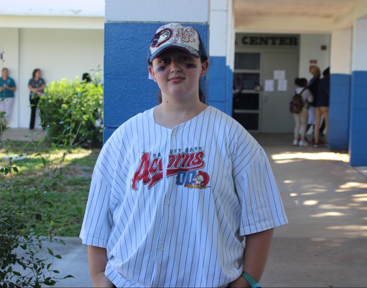 SPORTS GEAR DAY: Junior Dakota Sands celebrates the first day of Spirit Week by donning an Oakey Oaks Acorns baseball jersey from the 2005 Disney film