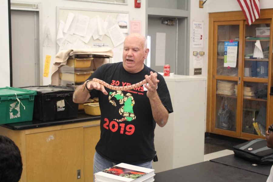 SERPENTS: Environmental Science teacher Dr. Spector invited his dad, Fred Spector on Oct. 25 to show his students different classes of snakes.