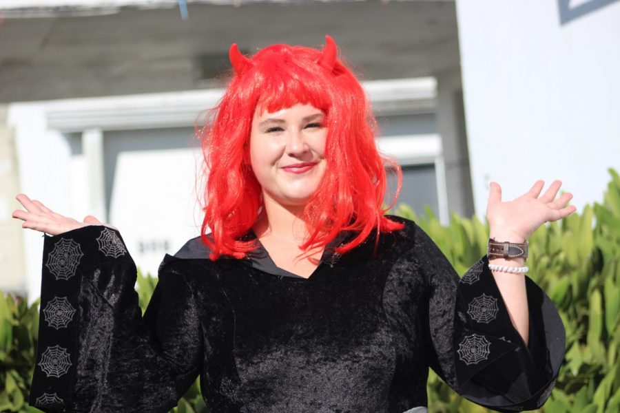 SATAN: English teacher Ms.Melbourne is dressed up as the devil for the spirit of Halloween.