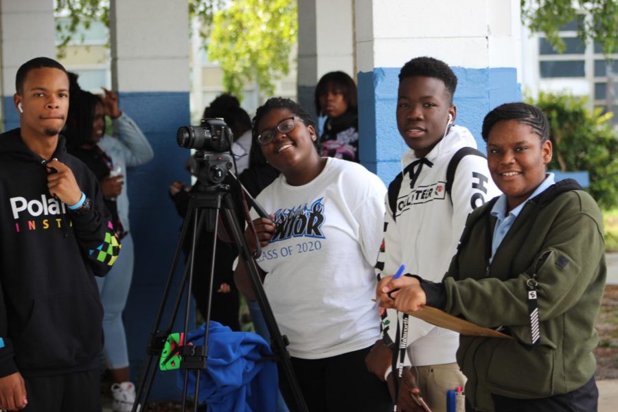 REPRESENTATION: Editor-in-Chief Brianna Luberisse (center) and Yearbook Co-Editor Brianna Dwyer (right) have been taking pictures of the freshmen, sophomores and juniors all this week for the 2019-2020 book.