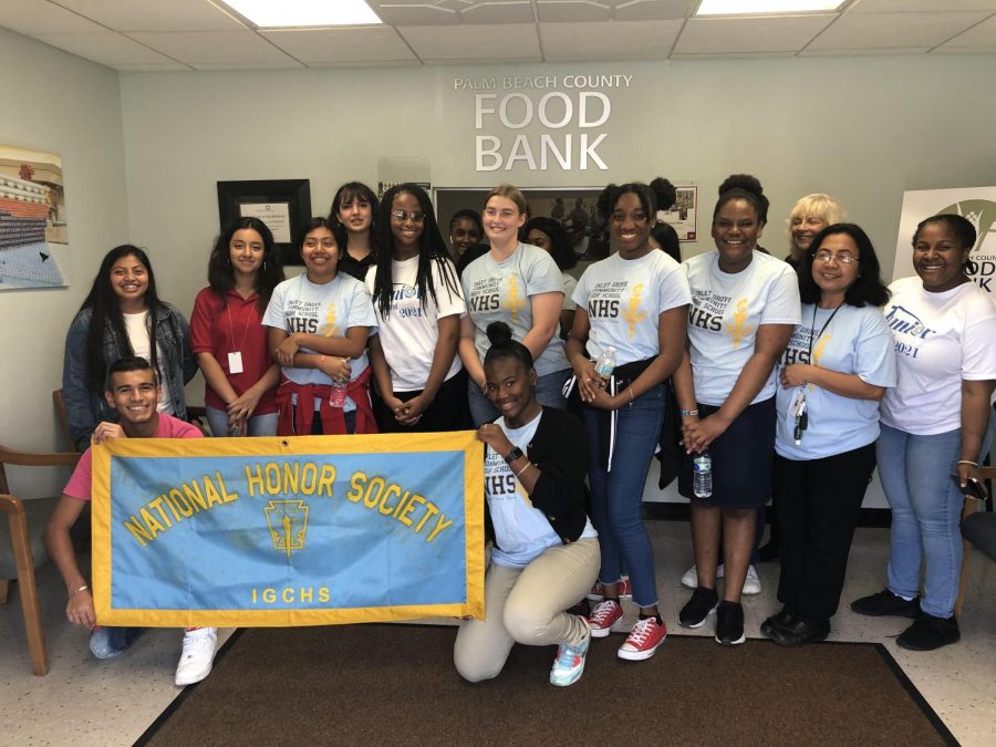 ACHIEVEMENT: Inlet Grove NHS team went to Palm beach County Food bank to help pack 320 weekend goodies for 600 identified middle school students of SDPBC and broke a record of 1.5 hrs to put things in the bags.