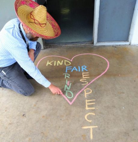 SPREADING LOVE THROUGH CHALK: Pre-Architecture instructor, Mr. Lambaz, drew a heart with the words kind, friends, fair and respect in front of his door using different color chalk for Anti Bullying Day on Feb. 26.