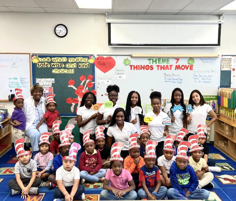 READING CELEBRATION: Ms. Cange and the Goal Chasers club attended West Riviera Elementary school to read books to the students in honor of Dr. Seuss Birthday. 