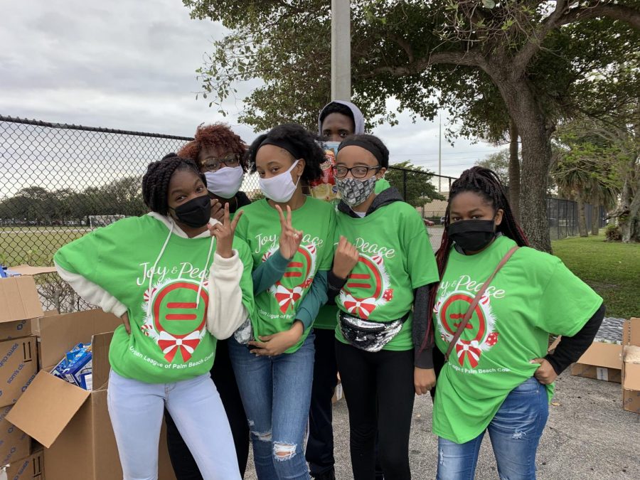 FOOD DISTRIBUTION: On Dec. 19 2020, The National Honors Society club participated in the annual Feeding South Florida drive-through food distribution.