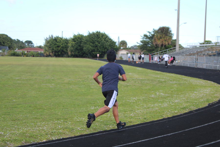 TRACK%3A+During+3rd+period%2C+students+in+Coach+Donavan+and+Coach+Fritz+class+were+relay+racing.