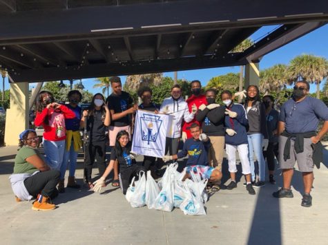 PILE UP: On January 15, NHS members went to Lake Worth beach for a community service event by picking up pieces of trash at the beach. After the clean-up, members took a moment of relaxation by eating Chick-Fil-A then some played Uno and others played football and soccer.