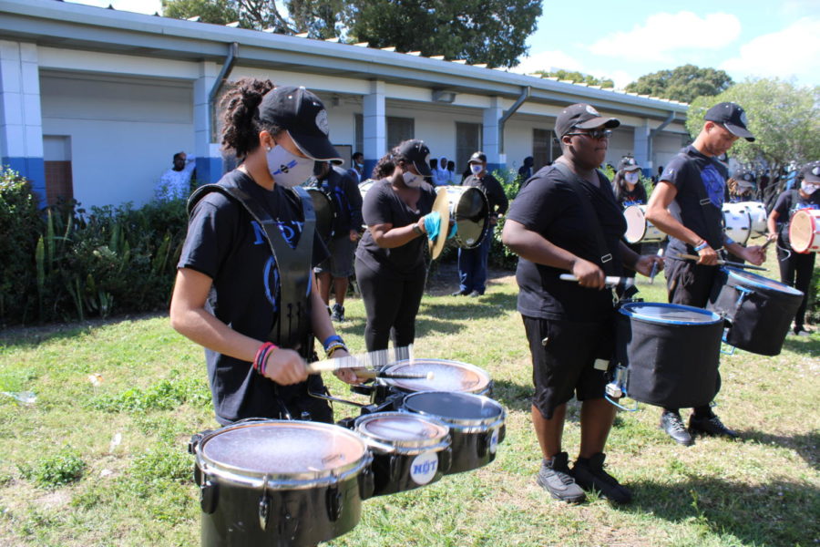 RUMBLE%3A+The+drumline+members+performed++for+students+and+staff+during+lunch+in+honor+of+++Black+History+Month.+