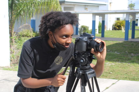 POINT OF VIEW: During second period, Israel Russell was outside taking photos of other students. She said, we are taking different kinds of shots for a project in Mr. Goldstein class. Its called the camera movement project.