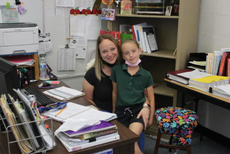 MINI ME: Ms. Goldstein partakes in Take Your Child To Work Day by bringing her daughter.