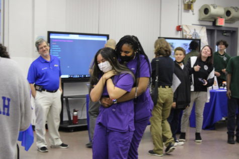 NURSING: Nursing Academy LPN students provide a demonstration on how to save a choking individual during the Open House in the cafeteria on May 5. 