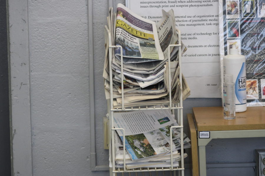 NEWSPAPER%3A+Mr.+Hanif+keeps+a+stack+of+todays+and+past+newspapers+from+the+Palm+Beach+Post+in+his+class+for+students+to+enjoy.