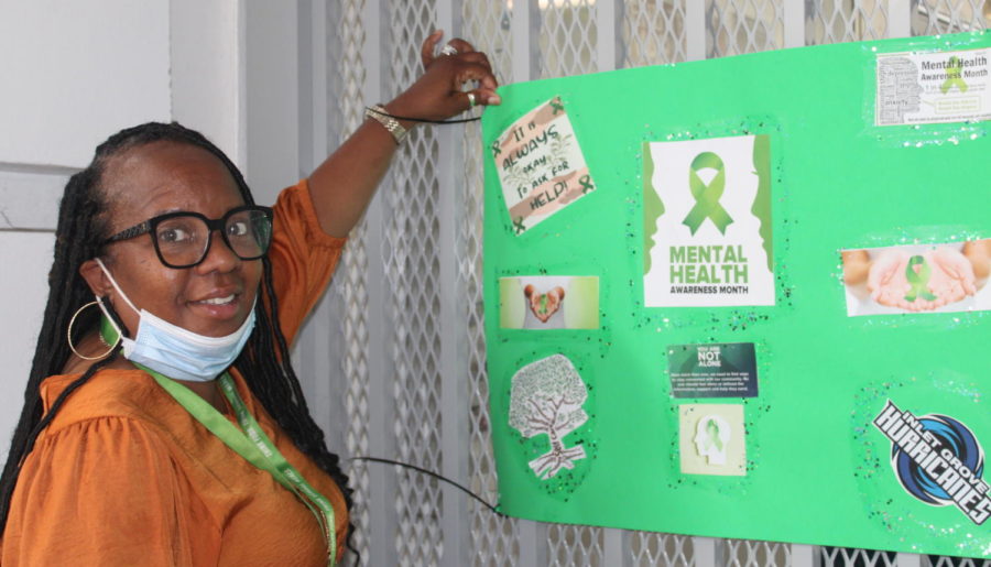 PROSPERITY: Ms. Skinner, administrative assistant put up posters in honor of Mental Health Awareness Month. 
