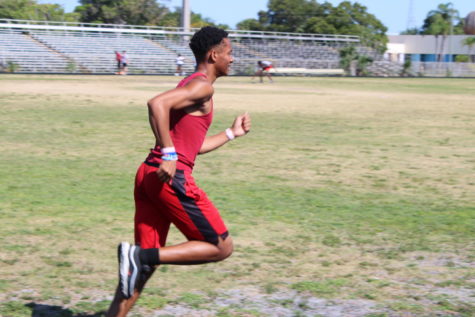 ROAD RUNNER: Students like Donvarious Johnson, shown above,  are completing their final exam for PE by doing 12 laps around the field.  