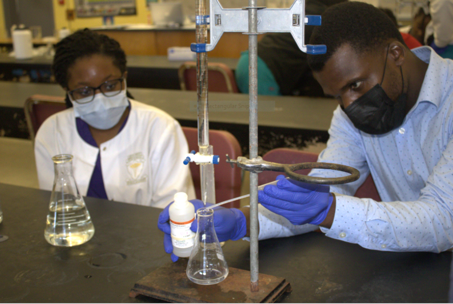 ANALYST: Chemistry teacher, Mr. Milce and his students performed a science experiment mixing sodium hydroxide and distilled water that made it purple. 