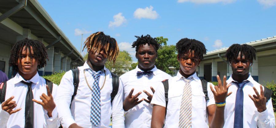 ALL IN: On Friday Aug.19 the football team dressed in their professional attire in preparation for their first kickoff game of the season against the Central Stallions. (From left) Zyon Willis, Christian Martin, Octavious Harris, Temarion Foster, and Emmanuel Cleonard.