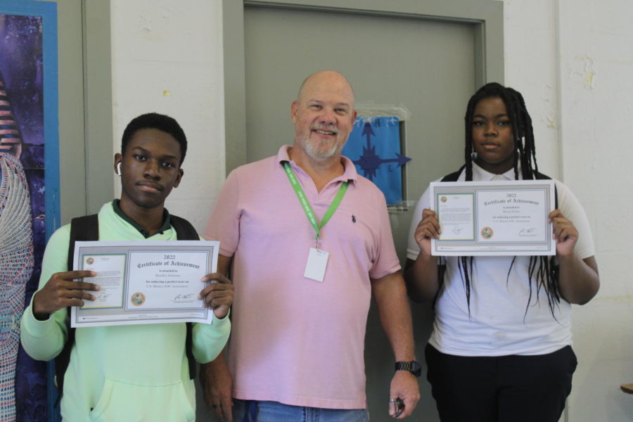 TRIUMPH: Breena Porter, Roodley Dorleans and Kern St. Jean (not pictured), were awarded a Certificate of Achievement from Governor Ron DeSantis for achieving a perfect score on their U.S. History EOC Assessment that they took Spring of 2022. Your achievement comes from dedication to studies in and out the classroom, said Governor Ron DeSantis, and I encourage you to continue striving for academic excellence and inspiring those around you. Breena Porter and Roodley Dorleans were taught by History teacher  Mr. Pauletti.
