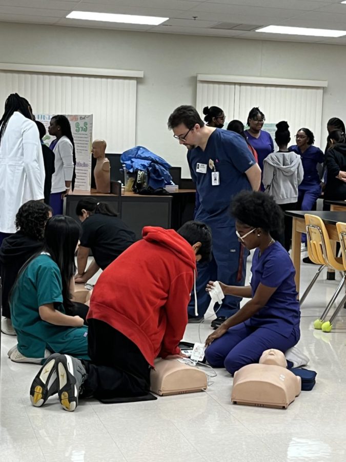 STAYN ALIVE: Pre-Medical and LPN students teach their fellow students how to properly deliver 30 chest compressions and 2 breaths while doing CPR.