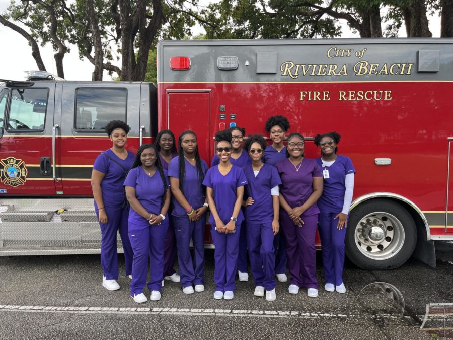 DEMONSTRATE: Medical Academy Director Nurse Graham took the Junior practical nurses to the Riviera Beach Fire Prevention Fair to educate the community and showcase their skills, Oct. 15. I was very impressed as were the experienced paramedics and firefighters, she said. They stated that they loved the energy our students brought to the fair.