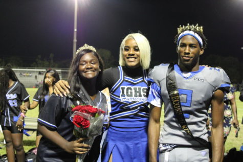 THATS ALL FOLKS: During halftime, Senior class President, Eli Jean-Baptiste announced the homecoming king and queen. After the Senior winners were announced, Eli then announced the Seniors of the varsity football team as they walked through with family and friends.          