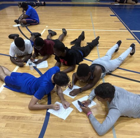 EVALUATE: Coach Donovan had her Physical Education class calculate their body mass index (BMI). This was set up for peer led learning in groups, she said. Those who understood were able to take the lead and teach others in the group who needed some extra help. 
Great opportunity for those who do not usually excel in athletics/PE, to have their turn to shine.