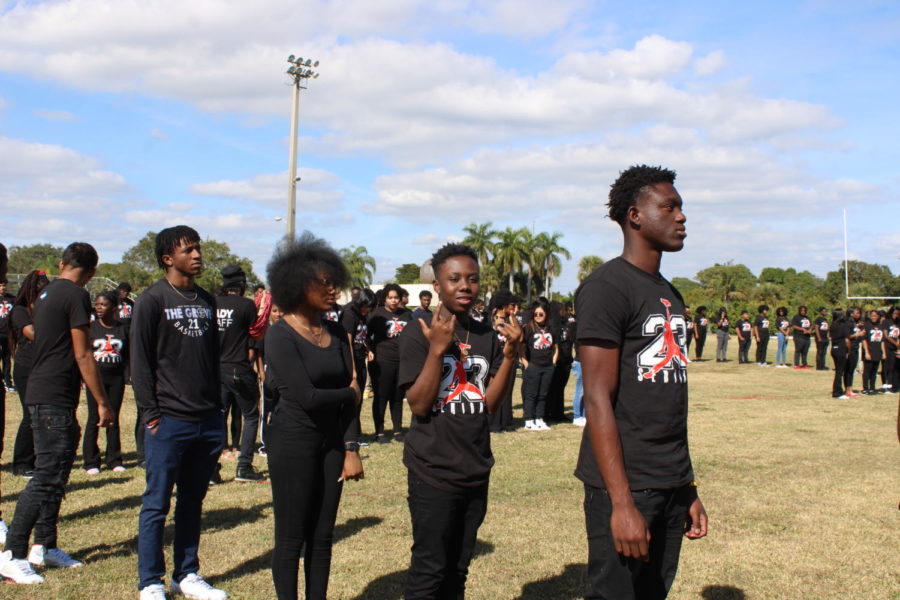 APPEARANCE: Senior canes takes their class of 2023 pictures at the football field on Jan.18.