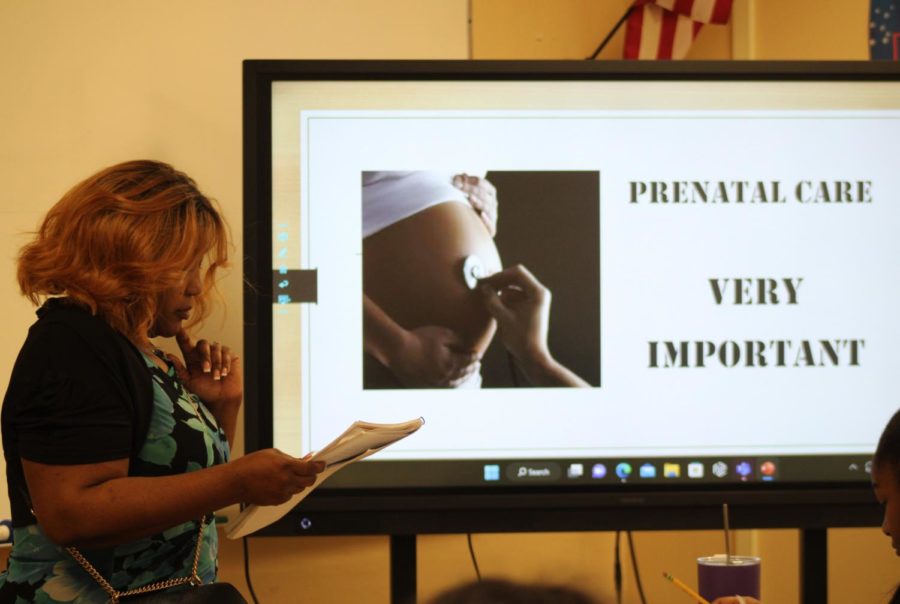 INFANTS: Martinie Nelson from the Community Voice program visits the Medical Academy to educate them on the importance of health care for pregnant women on Thursday, Feb. 2.