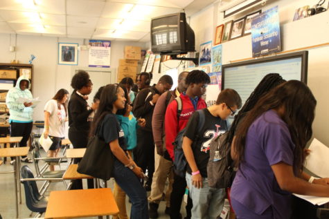 ITS HERE: Students swarmed to The Newsroom 203 to pick up The Hurricane 2023 Yearbook during lunch hour May 5 