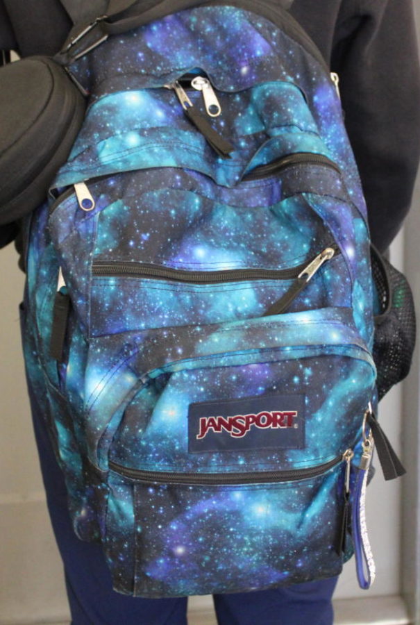 MILKY-WAY: Lets telescope it! A galactical Jansport bookbag takes you into outerspace.