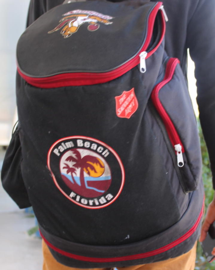 SWOOSH: A basketball bag for an out-of-school team sponsored by Salvation Army.