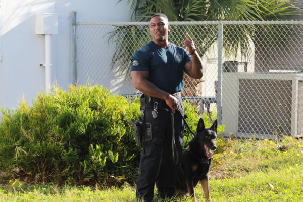 WHATS BARKING: Officer Walter Terrell invited Officer Kearney and a K9 Gin from the Riviera Beach Police Department to talk with his students. 