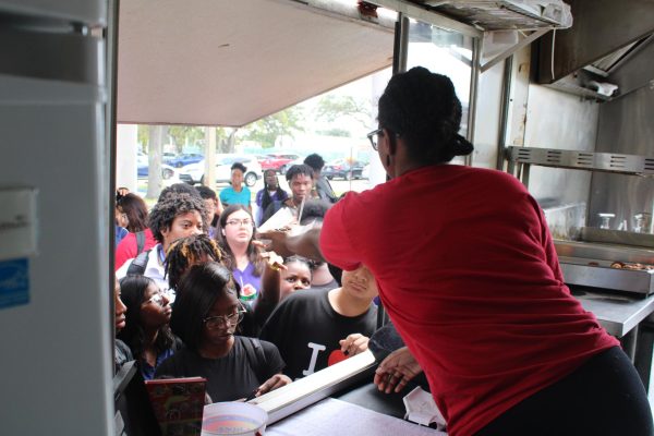 SIZZLE AND BITE: From 11:10AM to 1PM, SGA rewarded students with 1200+ HERO points access to the DOugh DOugh Donuts, PS561, and Kona Ice food trucks in the bus loop on Friday, Oct. 27.