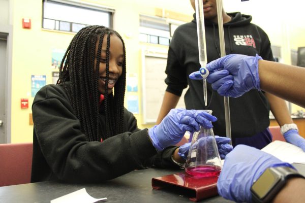 TITRATION: In each of Mr Milces class periods, students, such as Danica Ivey, conducted an acid-base neutralization lab to enhance their understanding of the current topic they are learning.